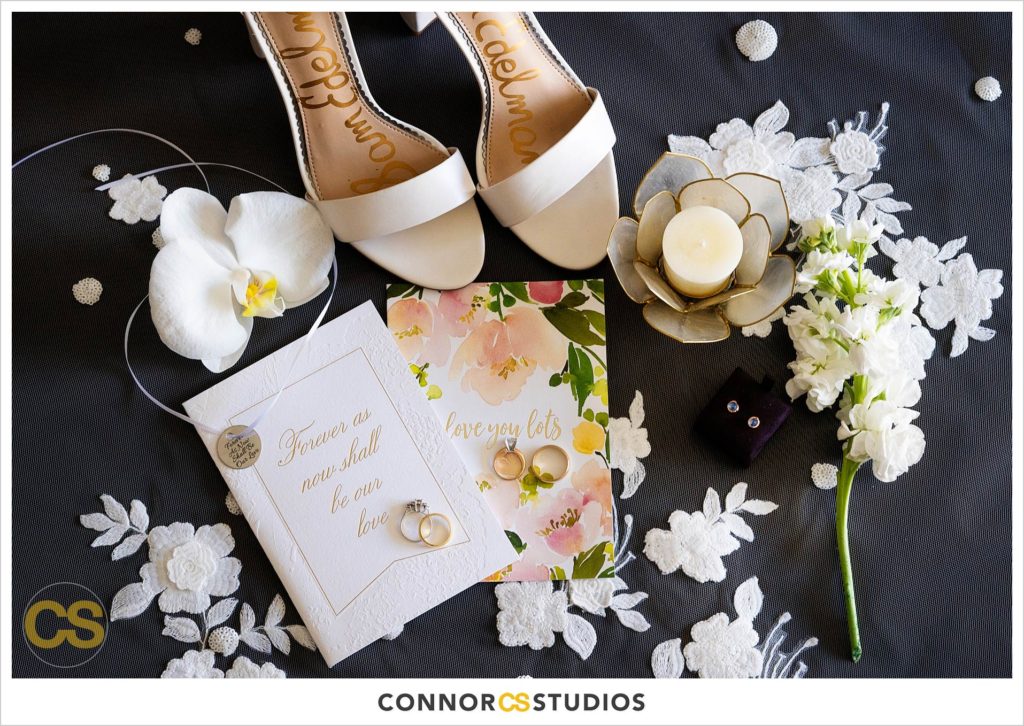 wedding details, rings, shoes and invitations at Fairmont Hotel in Washington, DC photography by Connor Studios 