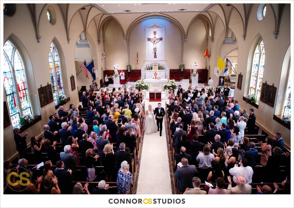 wedding ceremony and recessional at The Basilica of St. Mary Church in old town Alexandria, Virginia photography by Connor Studios 