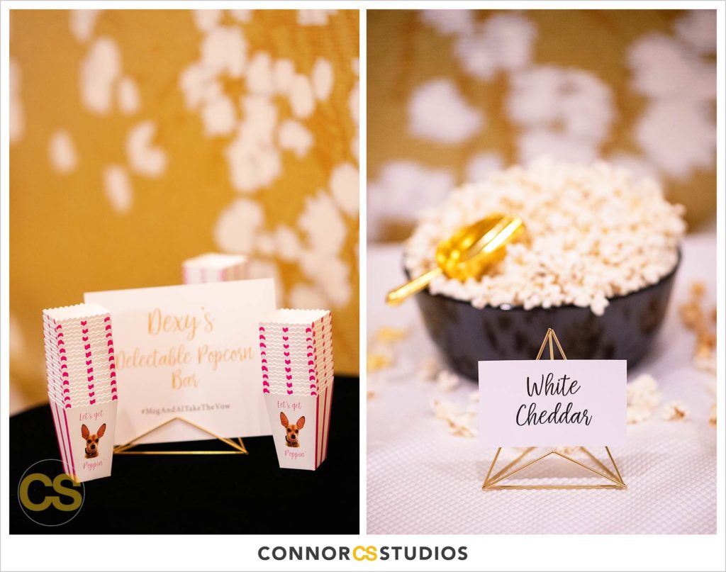 luxury wedding reception details of popcorn table and custom popcorn tub with dog in the ballroom at Fairmont Hotel in Washington, DC photography by Connor Studios 