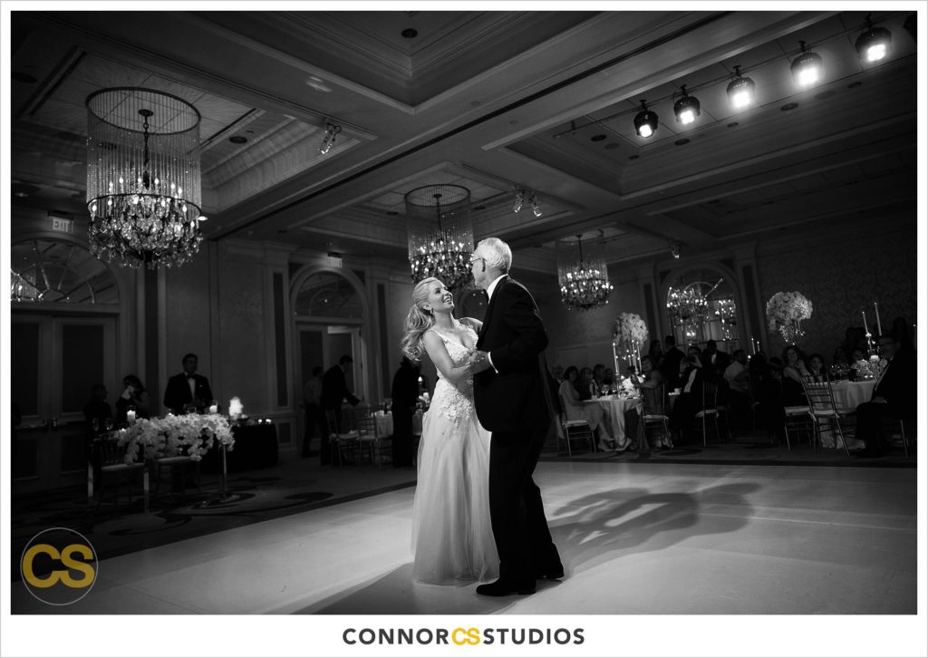 father daughter dance during luxury wedding in the ballroom at Fairmont Hotel in Washington, DC photography by Connor Studios 
