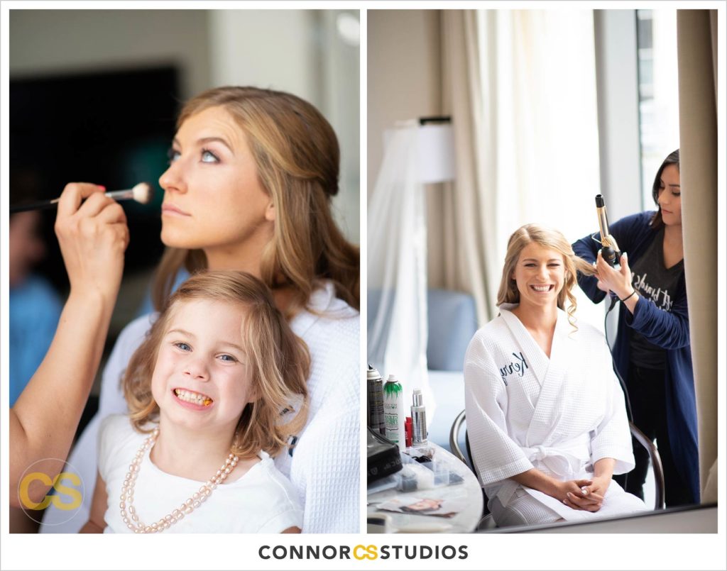 bride getting makeup and hair done by makeup by ana b at the conrad washington dc hotel by connor studios