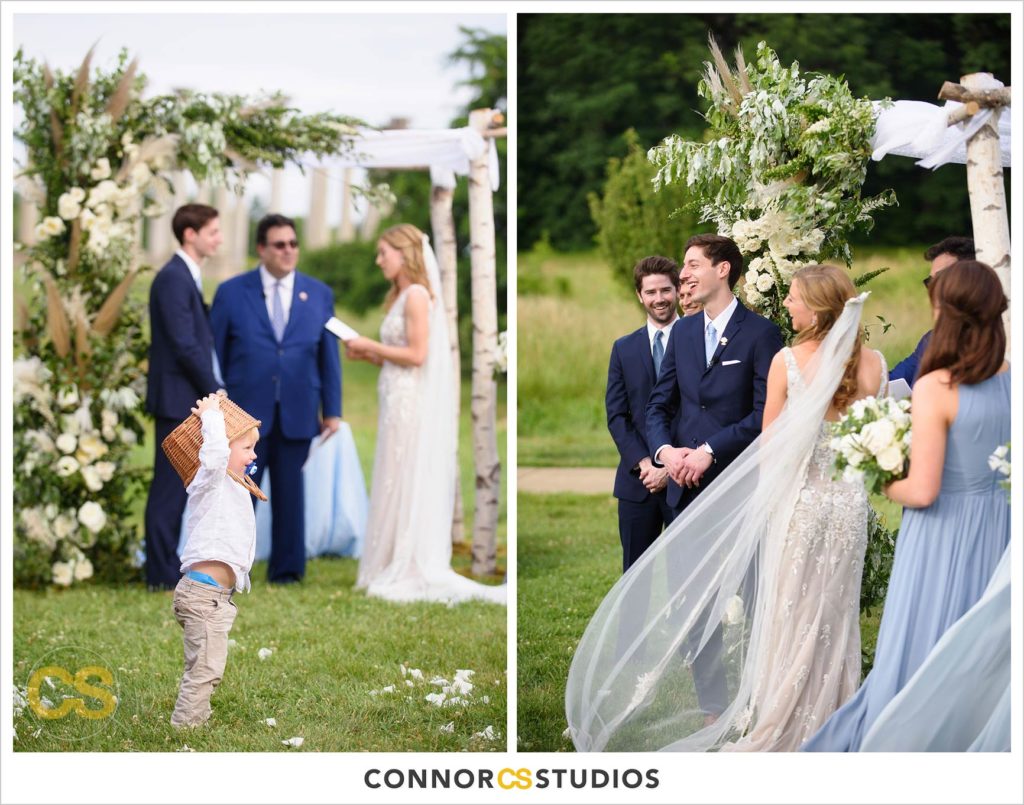 ring bearer with basket on head at outdoor summer wedding ceremony with the National Capitol Columns at the national arboretum in washington, dc by connor studios
