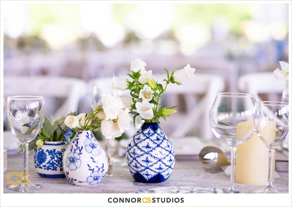 detail of rustic vintage table setting at large tented outdoor summer wedding reception at the national arboretum in washington, dc by connor studios
