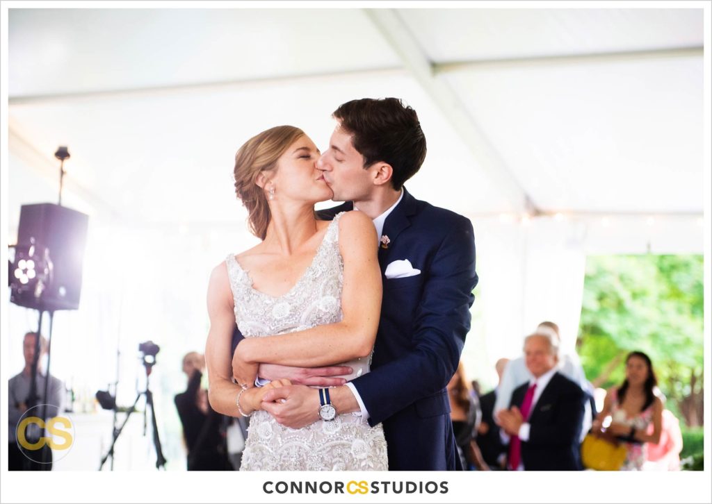bride and groom first dance large tented outdoor summer wedding reception at the national arboretum in washington, dc by connor studios