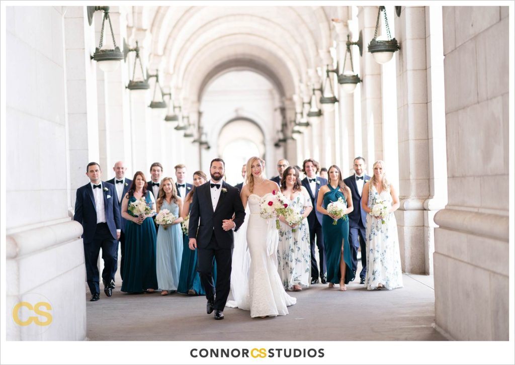 bride and groom and wedding party with green and white mismatched dresses portraits at union station in washington, dc by connor studios