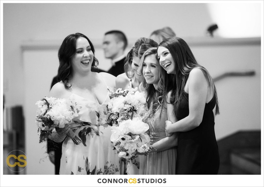 bridesmaids laughing at st. patrick's catholic church in washington, dc by connor studios