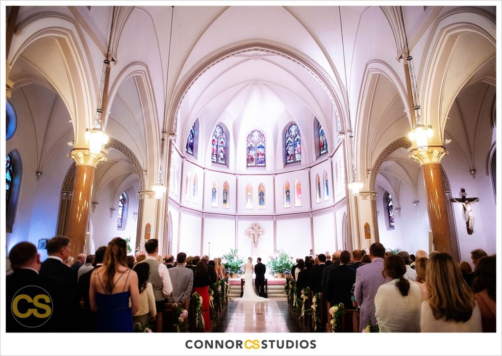 bride and groom at their wedding at st. patrick's catholic church in washington, dc by connor studios