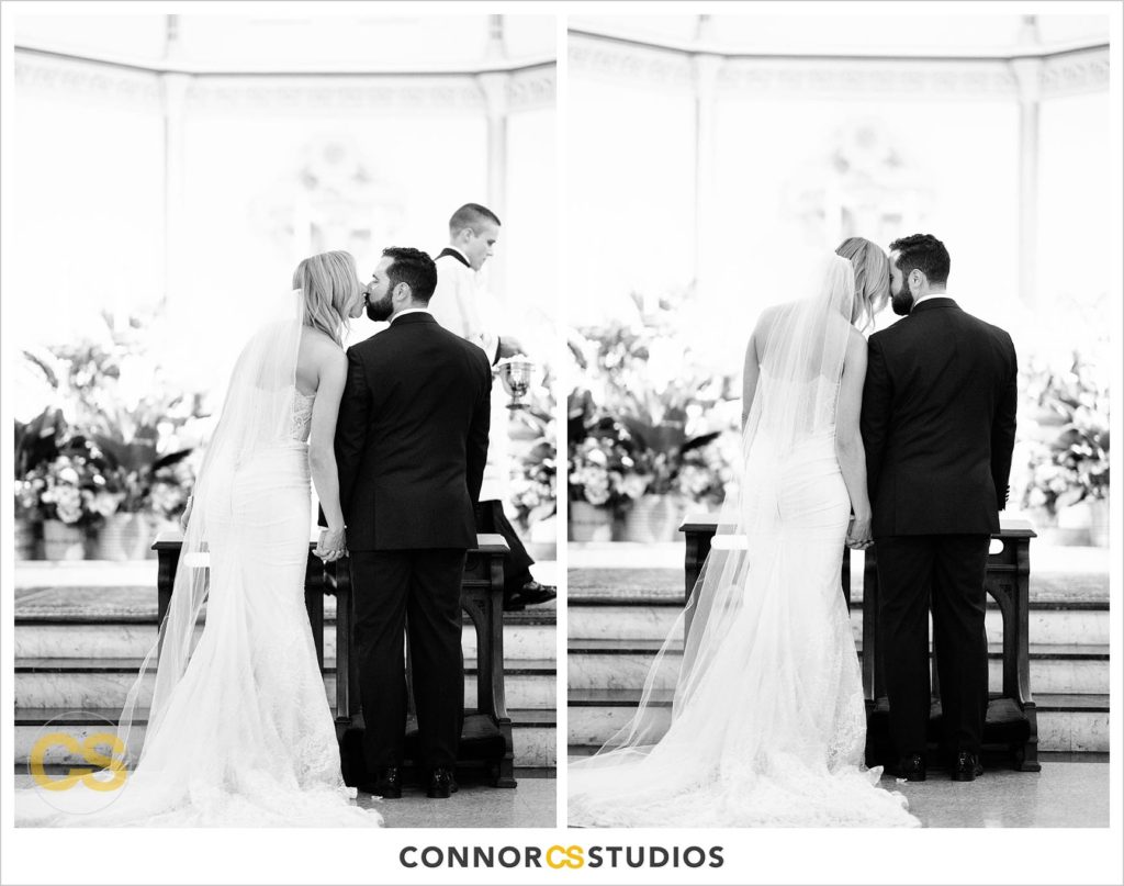 bride and groom first kiss at their wedding at st. patrick's catholic church in washington, dc by connor studios