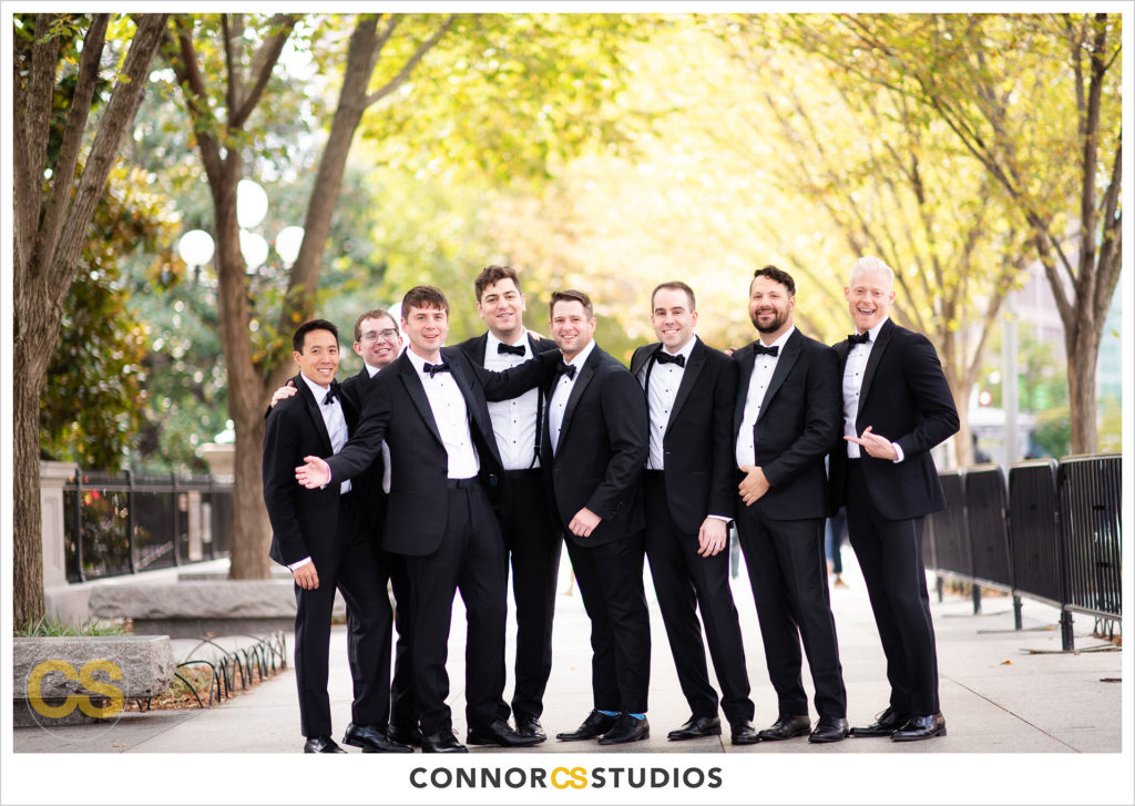 fall wedding portrait of groomsmen at lafayette park and the white house in washington, dc by connor studios