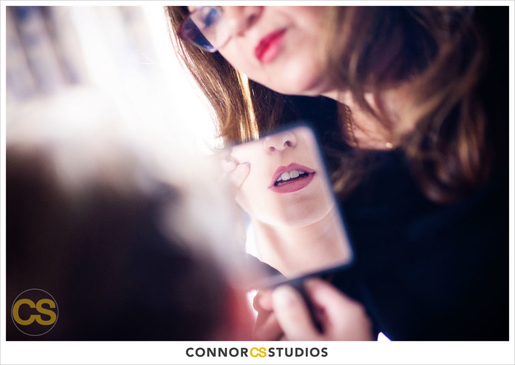 bride getting makeup by carola myers at the st regis hotel in washington, dc by connor studios