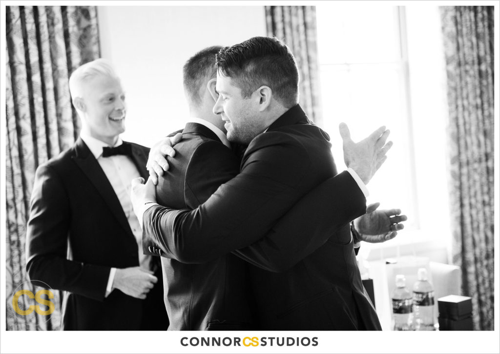 groom and groomsmen getting ready at the st regis hotel in washington, dc by connor studios