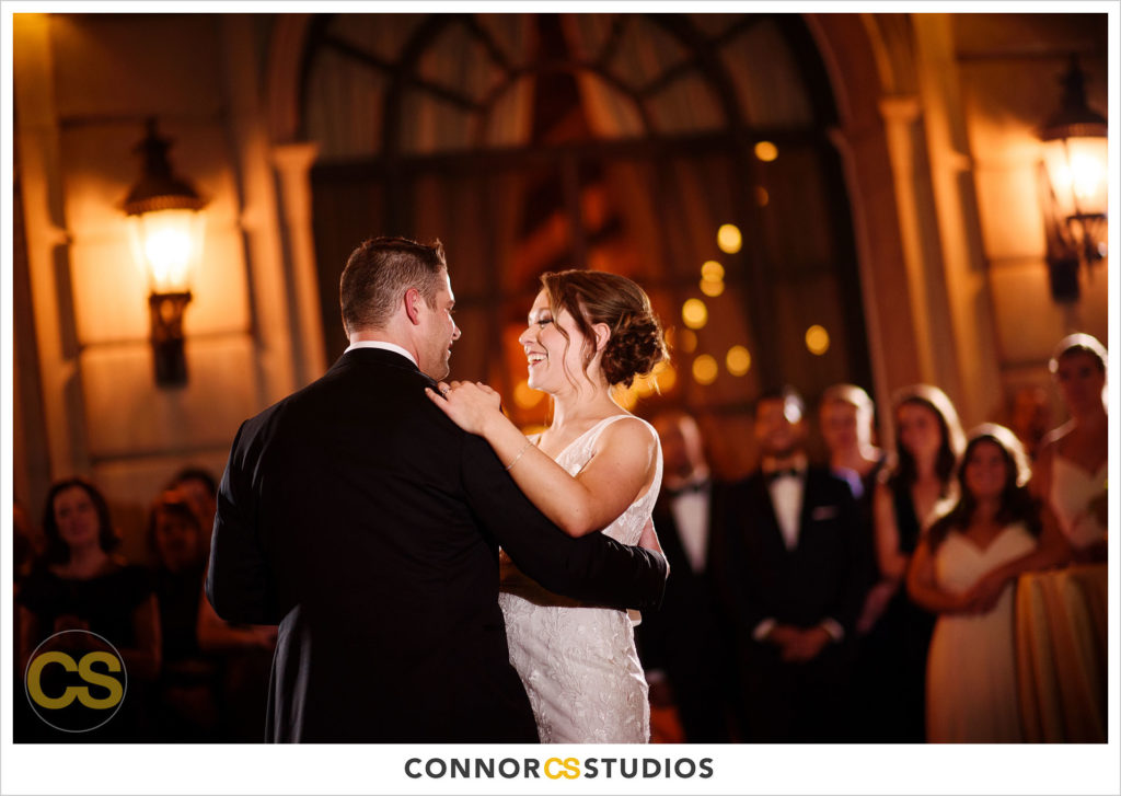 bride and groom's first dance on the astor terrace at night at the st regis hotel in washington, dc by connor studios