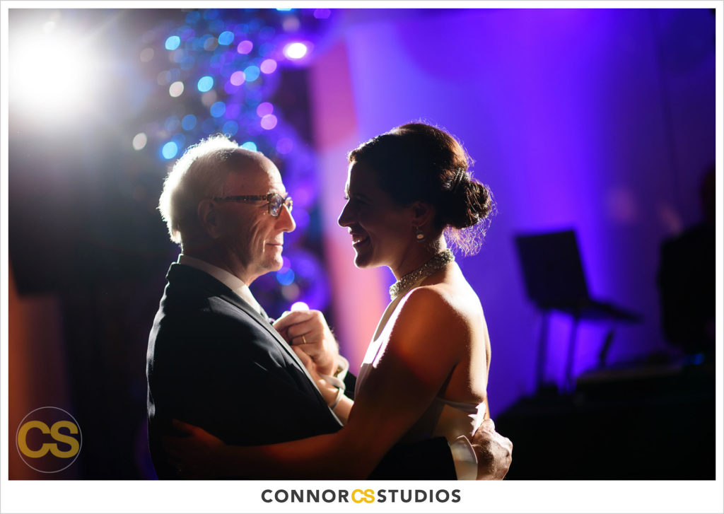 wedding reception father daughter dance at long view gallery with evoke design and creative in washington, dc by connor studios