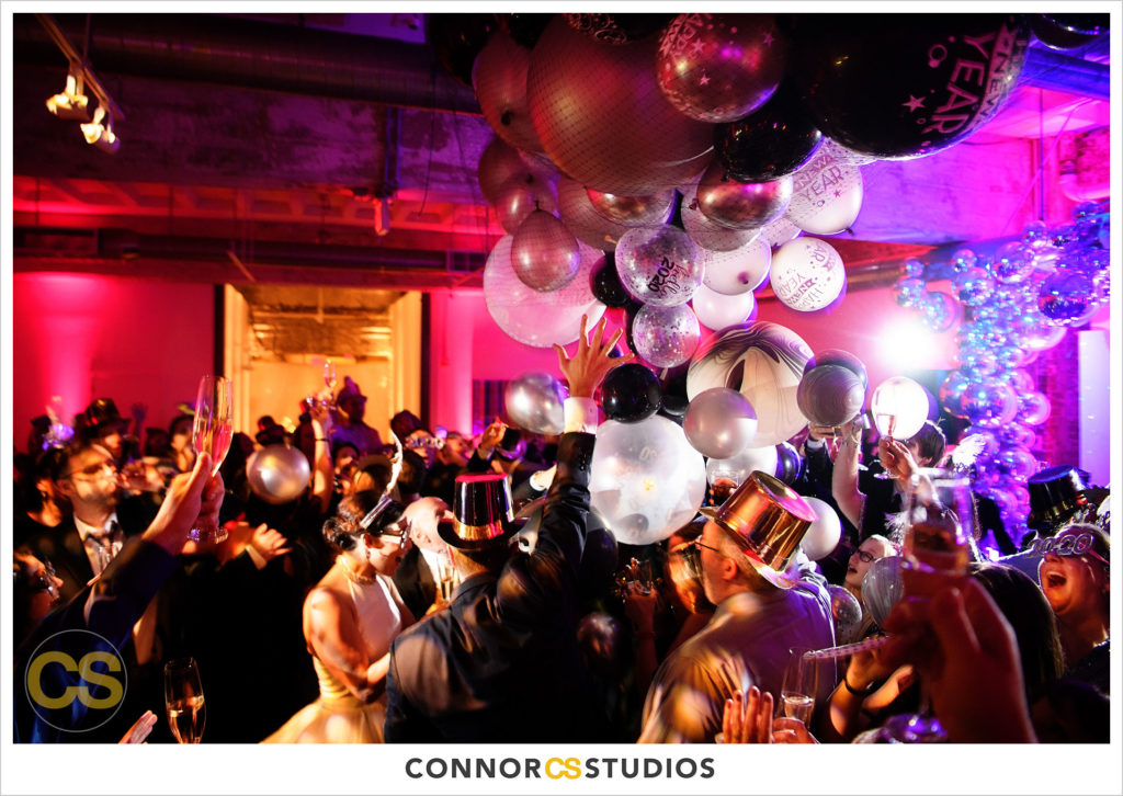 new year's eve 2020 wedding reception  at long view gallery with evoke design and creative and all about balloons in washington, dc by connor studios