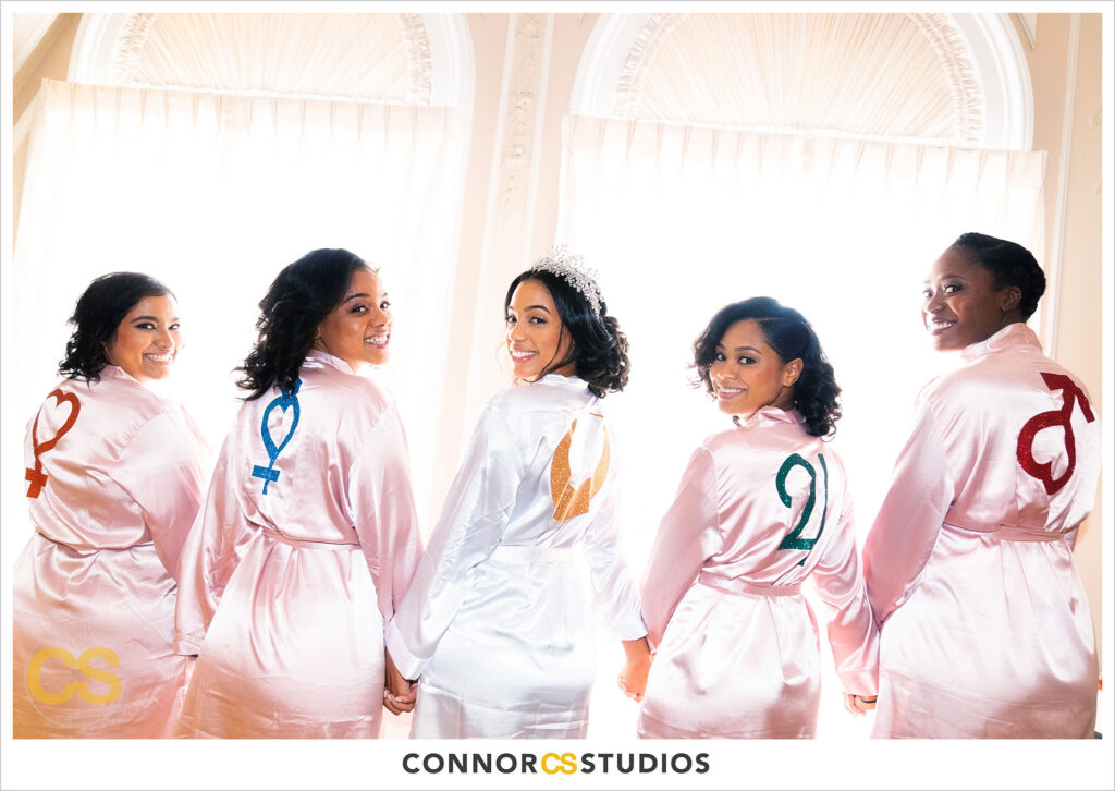 luxury wedding photography of bride and bridesmaids at the cosmos club during covid-19 in washington, dc by connor studios