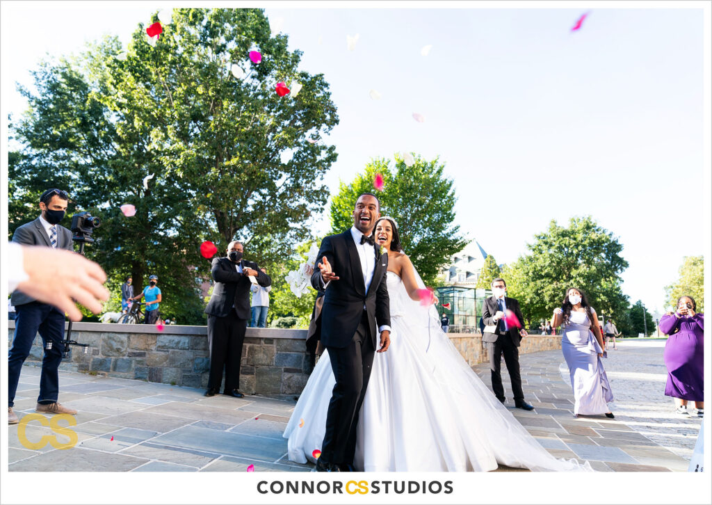luxury wedding rice toss at the national cathedral during covid-19 in washington, dc by connor studios